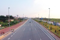 Đại lộ Võ Nguyên Giáp đã giảm nửa quãng đường ra Sân bay Nội Bài, giúp tăng sức thu hút đầu tư cho Hà Nội.