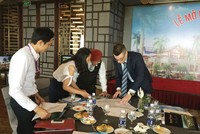 Nắm bắt nhu cầu của nhà đầu tư trong nước, nhiều công ty tư vấn đã tổ chức các buổi tọa đàm, giới thiệu chương trình đầu tư bất động sản ở nước ngoài. Ảnh: Bùi Trang