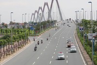 Hạ tầng giao thông phát triển khiến nhiều người có xu hướng chọn mua nhà ở ngoại ô để sinh sống. Ảnh: Dũng Minh