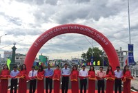 Lễ cắt băng thông xe dự án. Nguồn ảnh: T.Đồng/nld.com.vn