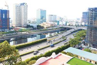 Thị trường địa ốc phát triển tạo đà cho cổ phiếu bất động sản bứt phá. Ảnh: Lê Toàn