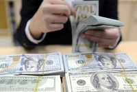 Lãi suất cơ bản USD tăng, lo chảy ngược ngoại tệ