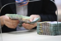 Hậu M&A ngân hàng, xử lý nợ xấu vẫn là thách thức