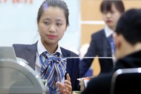 Trong tháng 11, chênh lệch huy động vốn - tín dụng VND đã thu hẹp 60.000-70.000 tỷ đồng và có thể co hẹp thêm 20.000-30.000 tỷ đồng trong tháng 12