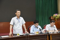 Phó Chủ tịch UBND quận Bắc Từ Liêm Nguyễn Kim Vinh thông tin tại hội nghị.