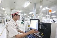 Môi trường kinh doanh tại Việt Nam không ngừng được cải thiện, tạo thuận lợi cho hoạt động doanh nghiệp. Ảnh: Đ.T