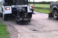 Xe vá ổ gà trong vòng vài phút