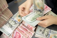 Ngân hàng Trung ương Trung Quốc khẳng định sẽ hỗ trợ các doanh nghiệp đủ điều kiện để họ khởi động lại sản xuất kinh doanh sớm nhất có thể. Ảnh: AFP