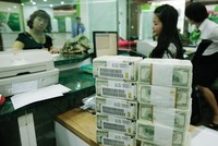 Tỷ giá USD/VND trong năm nay được dự báo chỉ biến động trên dưới 2%. Ảnh: Đức Thanh