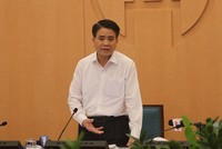 Chủ tịch UBND TP Nguyễn Đức Chung tại phiên họp sáng 30/3 .Ảnh Công Thọ