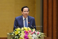Bộ trưởng Bộ Lao động, Thương binh và xã hội Đào Ngọc Dung trình bày Tờ trình Dự án Luật Đưa người VIệt Nam đi làm việc ở nước ngoài