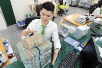 Dư địa giảm trích lập dự phòng rủi ro cho các ngân hàng không lớn. Ảnh: Đức Thanh