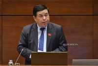 Bộ trưởng Bộ Kế hoạch và Đầu tư Nguyễn Chí Dũng phát biểu tại phiên họp chiều 15/6 của Quốc hội. 