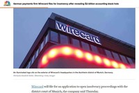 Hãng tin CNBC đưa tin Wirecard phá sản, với ảnh chụp trụ sở Wirecard tại Đức