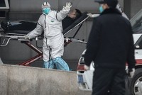 WHO chú ý tới các ca viêm phổi ở Vũ Hán trước khi nhận được thông báo của Trung Quốc. Ảnh: AFP.