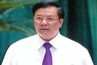 Bộ trưởng Bộ Tài chính Đinh Tiến Dũng trả lời chất vấn tại Quốc hội chiều 10/6 (Ảnh chụp qua màn hình)