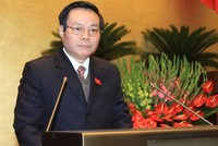 Chủ nhiệm Uỷ ban Tài chính - Ngân sách đánh giá Phùng Quốc Hiển đọc báo cáo thẩm tra quyết toán ngân sách Nhà nước 
