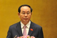 Chủ tịch nước Trần Đại Quang đọc tờ trình. Ảnh: Giang Huy