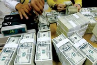 Tỷ giá trung tâm ngày 19/5 tăng mạnh 21 đồng/USD, giá vàng giảm sâu