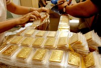 Giá vàng tiếp tục giảm sâu, tỷ giá trung tâm giảm 9 đồng/USD ngày 27/5