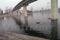 Hồ Hoàng Cầu (quận Đống Đa, Hà Nội) sau khi khắc phục xong tình trạng cá chết trắng hồ vào ngày 8/6. (Ảnh: Minh Nghĩa/Vietnam+)