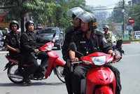 Từ 2/9: Cảnh sát cơ động không được dừng xe vi phạm mũ bảo hiểm