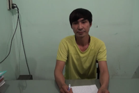 Đối tượng Nguyễn Xuân Long tại cơ quan điều tra - Ảnh cắt từ Clip