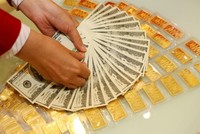 Sáng 22/12, giá vàng và tỷ giá USD đồng loạt giảm nhẹ
