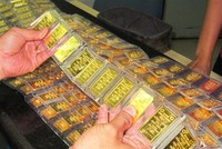 Sáng 21/3, vàng giảm mạnh 100.000 đồng/lượng, tỷ giá USD trầm lắng