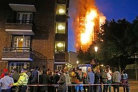 Chung cư Grenfell ở London bị cháy hôm 14/6. Ảnh: Evening Standard.