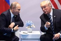 Tổng thống Nga và Tổng thống Mỹ trong cuộc gặp tại G20. Ảnh: AFP