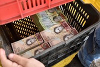 Đồng bolivar. Ảnh Internet