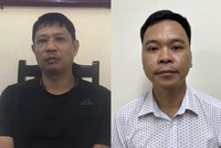 Bị can Bùi Quốc Việt (trái) và bị can Võ Việt Hùng. 