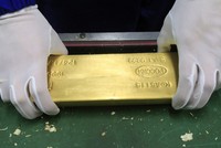 Vàng đột ngột tăng vọt nhờ tin kinh tế xấu