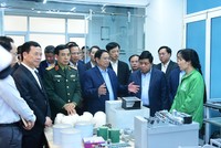 Thủ tướng Chính phủ Phạm Minh Chính và đoàn công tác tới thăm và làm việc tại Trung tâm Đổi mới sáng tạo quốc gia (NIC). Ảnh: Dũng Minh
