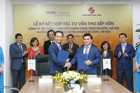 Ông Đinh Quang Huy, Tổng giám đốc SHB Finance và ông Vũ Đức Tiến, Tổng giám đốc SHS trong Lễ ký kết