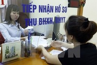 Doanh nghiệp nợ tiền bảo hiểm, người lao động lao đao. Ảnh minh họa: TTXVN