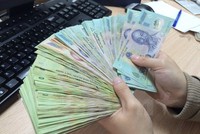 Đồng Việt Nam dưới góc nhìn của báo nước ngoài