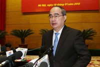 Ông Nguyễn Thiện Nhân, Bí thư Thành uỷ TP HCM, cho rằng "cấp trên đốt lửa to nhưng cấp dưới còn chậm". Ảnh: TTX