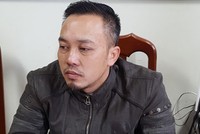 Nguyễn Đức Minh tại trụ sở công an.