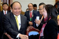 Trong cuộc gặp kiều bào, Thủ tướng nói "Tổ quốc luôn lắng nghe hơi thở của bà con". Ảnh: Quang Hiếu/VGP