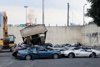 Các xe sang bị nghiền nát ở Manila ngày 6/2. Ảnh: Reuters.