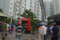 Hiện trường vụ cháy chung cư 12T5 Nại Hiên Đông. (Ảnh: Đinh Văn Nhiều/TTXVN).