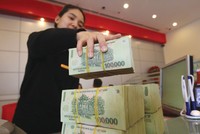 Nợ xấu tăng “song hành” với lợi nhuận ngân hàng