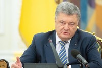 Tổng thống Ukraine Petro Poroshenko phát biểu trước Hội đồng An ninh Quốc gia ở thủ đô Kiev hôm 26/11. Ảnh: Reuters.
