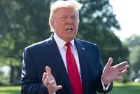 Tổng thống Mỹ Donald Trump trả lời báo chí tại Nhà Trắng hôm nay. Ảnh: AFP.