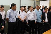 Các đại biểu Quốc hội tìm hiểu về thị trường chứng khoán tại Sở Giao dịch chứng khoán Hà Nội, tháng 7/2019.