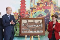 Bức tranh “Phố Phái” được lựa chọn để giới thiệu 
trong lễ khai trương văn phòng UOB tại Hà Nội tháng 8/2019.