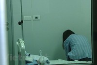 Một bệnh nhân mắc bệnh viêm đường hô hấp cấp do chủng mới của virus corona điều trị tại Bệnh viện Bệnh Nhiệt đới Trung ương. (Ảnh: PV/Vietnam+).