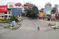 Đường phố Hà Nội vắng lặng trong những ngày giãn cách xã hội. (Ảnh: Thanh Tùng/TTXVN).